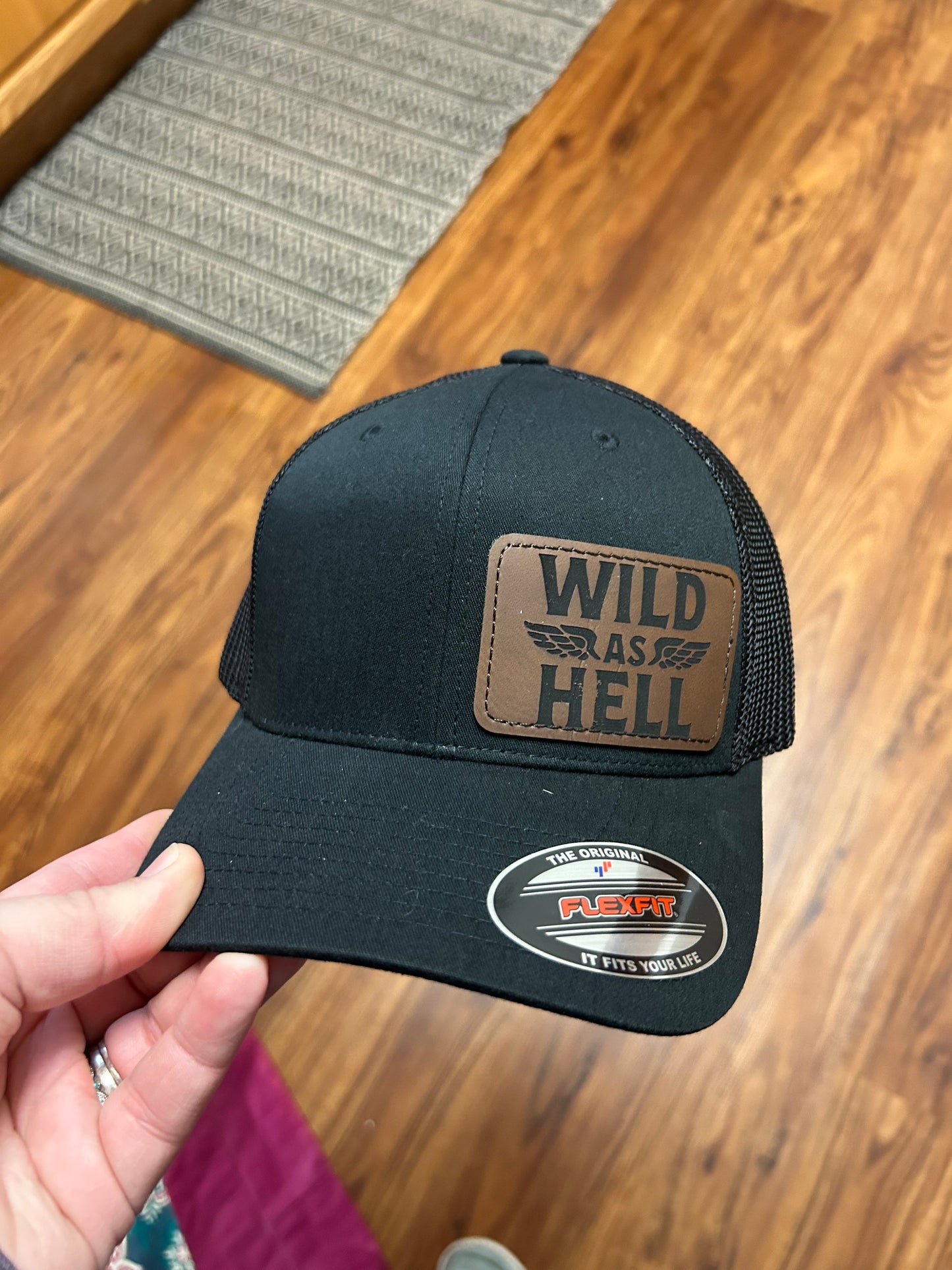 Black fitted hat with wild as hell patch