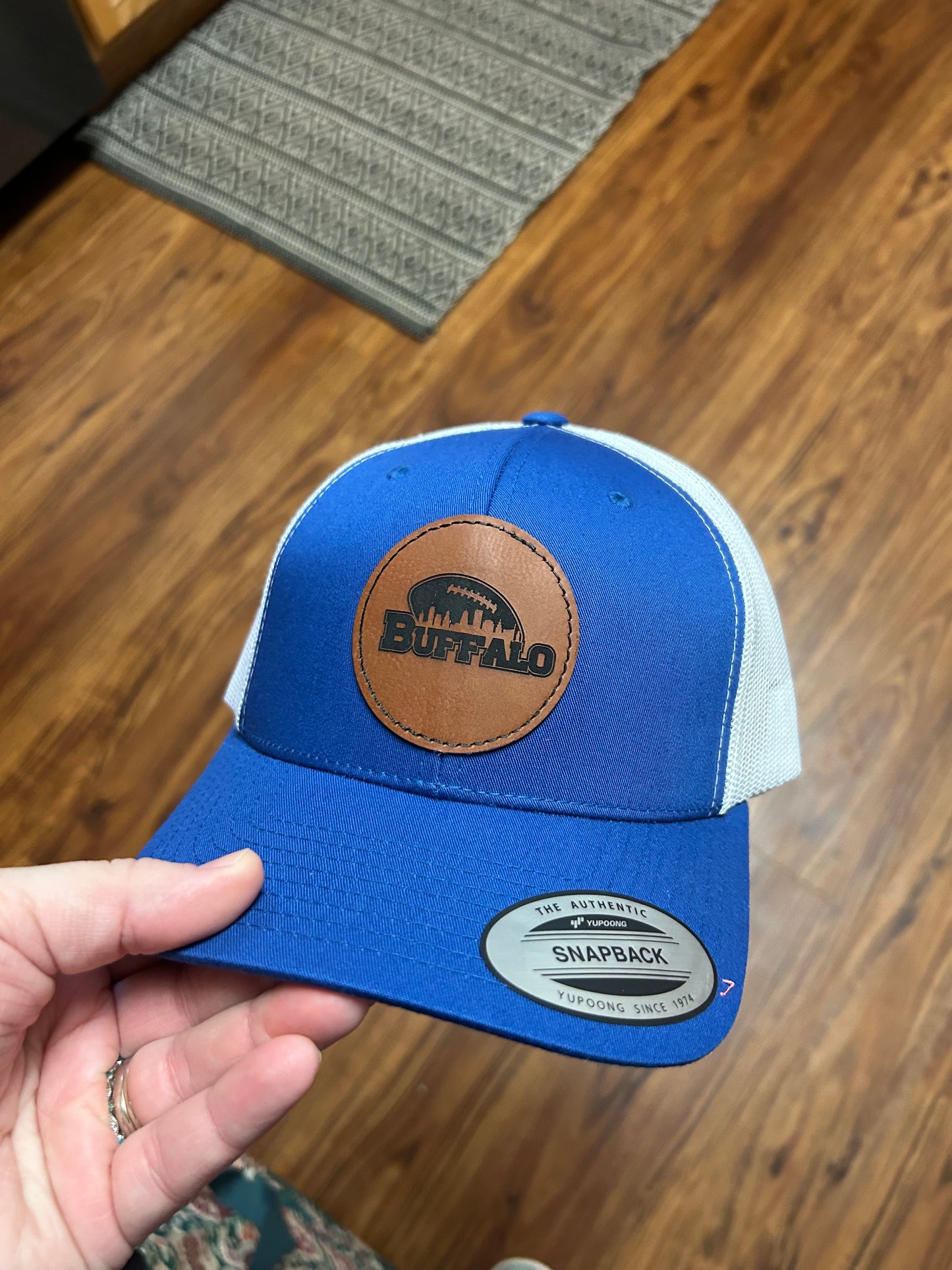 Royal blue hat with buffalo patch