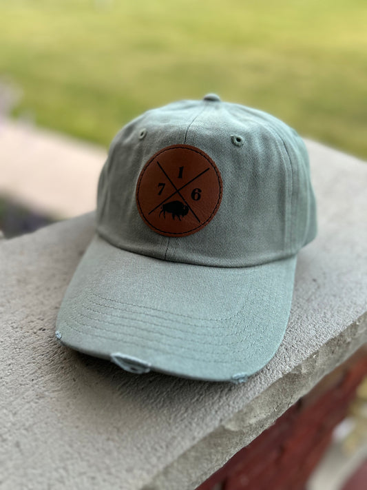 Olive green ponytail hat with 716 patch